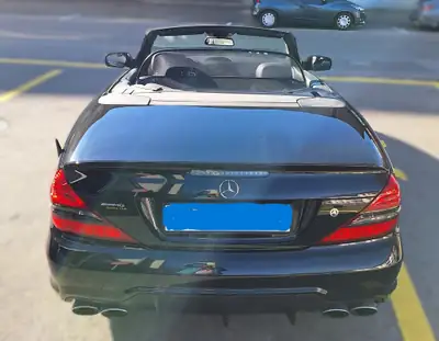 Mercedes-Benz SL 63 AMG — Roadster sportif légendaire, 525 ch et seulement 62 500 km — Miniatura 8
