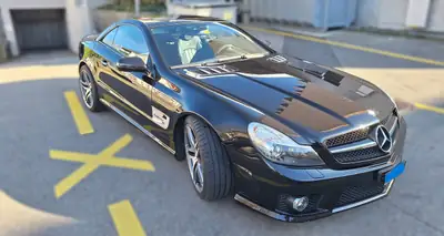 Mercedes-Benz SL 63 AMG — Roadster sportif légendaire, 525 ch et seulement 62 500 km — Miniatura 12