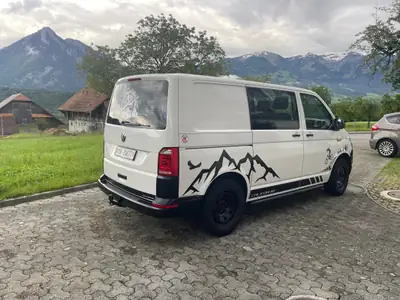 VW T6 2.0 TDI DSG — Utilitaire polyvalent, 150 ch fiable et économe — rear view