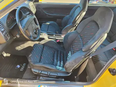 BMW M3 Coupé 1993 — Légende sportive jaune vif, 82 500 km seulement — dettaglio