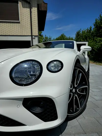 Bentley Continental GTC 4.0 V8 Mulliner — Cabriolet de luxe, 550 ch et seulement 29'000 km — Heckansicht