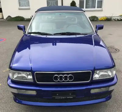 Audi Cabriolet 2.3e — Décapotable classique des années 90, moteur essence 2.3L — Seitenansicht