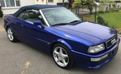 Audi Cabriolet 2.3e — Décapotable classique des années 90, moteur essence 2.3L — Außenansicht