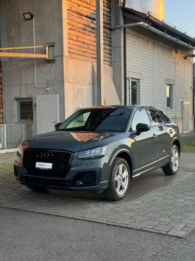 Audi Q2 1.4 TFSI Sport S-tronic — SUV urbain dynamique, entretien inclus — exterior view