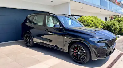BMW X5 xDrive 50e M Sport Pro — SUV hybride rechargeable 489 ch, garantie constructeur — vista posteriore