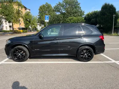 BMW X5 xDrive 40e iPerformance — SUV hybride rechargeable, 313 ch et consommation réduite — Seitenansicht
