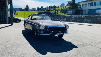 Volvo P1800 1963 — L'icône suédoise aux 74 500 km, coupé sport vintage authentique — côté