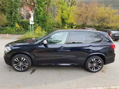 BMW X5 xDrive M50d — SUV premium diesel, 381 ch et confort 5 places — side view