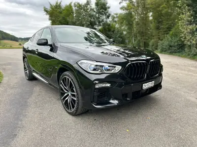 BMW X6 M50d 2020 — SUV coupé premium, 400 ch diesel, équipement complet — côté