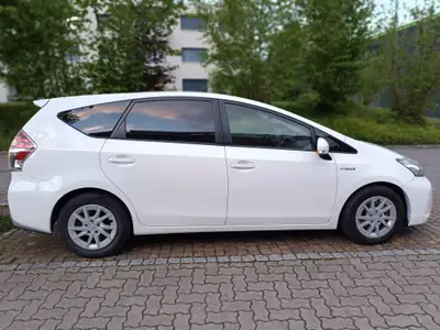 Toyota Prius+ 1.8 VVT-i HSD Comfort — Monospace hybride 7 places, faible consommation — côté