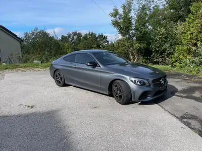 Mercedes-Benz C 200 Coupé 4Matic AMG Line — Élégance sportive et technologie hybride — vue extérieure