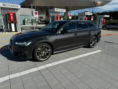 Audi A6 Avant 3.0 TDI V6 Quattro — Breaks premium avec moteur puissant et équipements luxe — Seitenansicht
