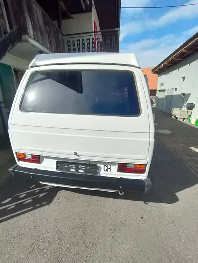 VW T3 Typ 2 1981 — Le classique van californien, moteur d'époque authentique — vista posteriore