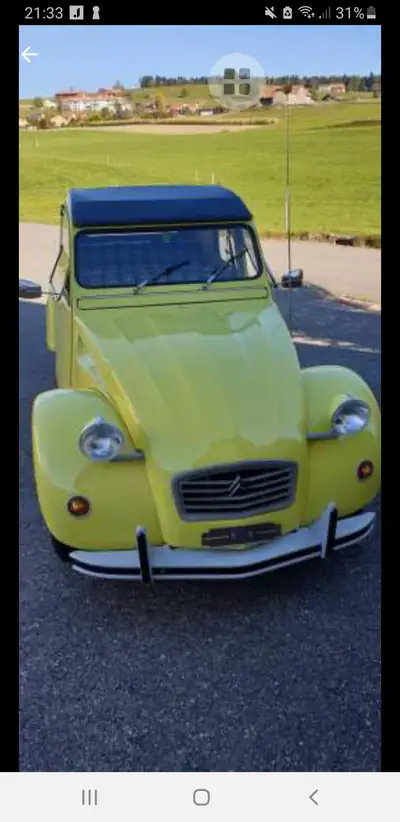Citroën 2CV 4 — L'icône française restaurée, 75'000 km, jaune éclatant — côté