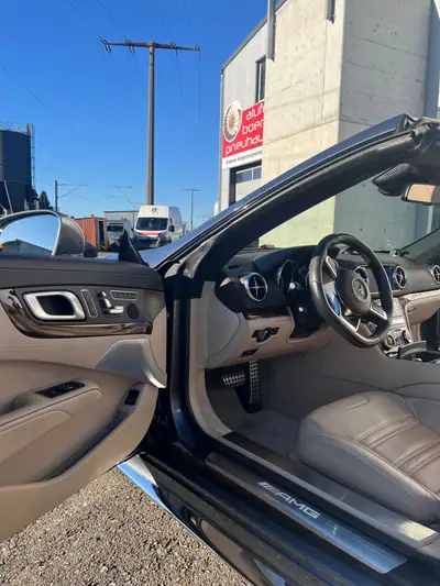 Mercedes-Benz SL 63 AMG — Roadster légendaire 585 ch, état de collection exceptionnel — Miniatura 16