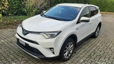 Toyota RAV-4 2.5 HSD Edition — SUV hybride performant, entretien réduit, état impeccable — side view