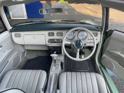 Nissan Figaro 1993 — Cabriolet rétro culte, moteur économe et sans sinistre — Miniatur 12
