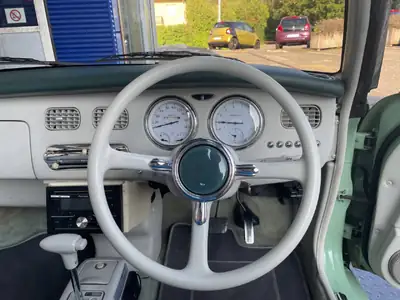 Nissan Figaro 1993 — Cabriolet rétro culte, moteur économe et sans sinistre — Miniatur 15