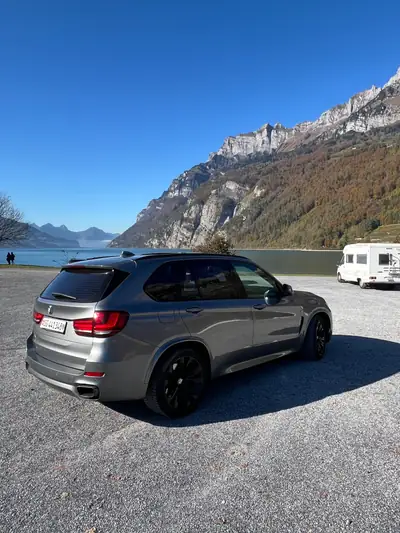 BMW X5 xDrive 50i — V8 500ch, son signature M et châssis Dähler — Miniature 9