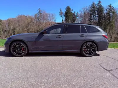BMW M340d xDrive — Break sportif diesel hybride, 45000 km seulement — side view