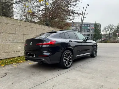 BMW X4 xDrive 30d M Sport — SUV coupé premium, 286 ch et consommation maîtrisée — vista posteriore