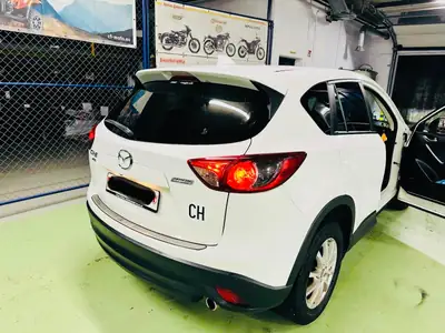 Mazda CX-5 2.2 D Revolution AWD — SUV diesel robuste, 156'000 km, traction intégrale — rear view