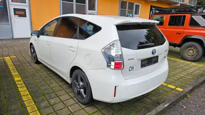 Toyota Prius+ 1.8 VVT-i HSD — Monospace hybride spacieux, entretien récent — vista posteriore