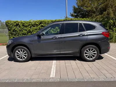 BMW X1 xDrive18d Sport Line — SUV compact diesel performant, entretien premium — Seitenansicht