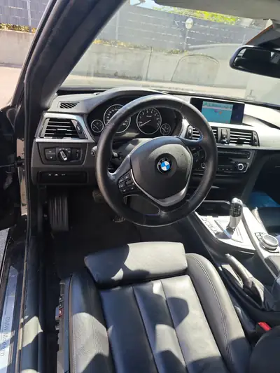 BMW 328i xDrive Cabriolet — Élégance décapotable, motorisation performante et équipements premium — fianco