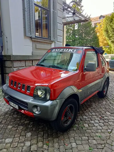 Suzuki Jimny 1.3 16V JLX Top — Authentique SUV compact tout-terrain, sans accident — fianco