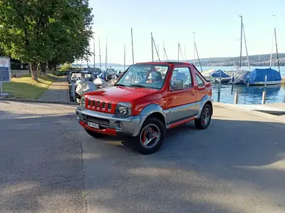 Suzuki Jimny 1.3 16V JLX Top — Authentique SUV compact tout-terrain, sans accident — vista esterna