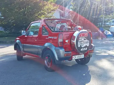 Suzuki Jimny 1.3 16V JLX Top — Authentique SUV compact tout-terrain, sans accident — vista posteriore