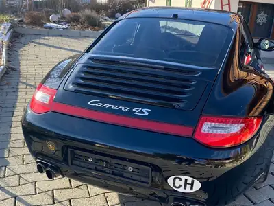 Porsche 911 Carrera 4S PDK — Coupé sportif 385 ch, traction intégrale, faible kilométrage — vista posteriore