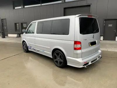 VW T5 Multivan Comfortline 2.5 TDI — Minibus 7 places, diesel fiable et spacieux — fianco