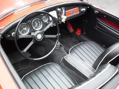 MG MGA 1959 — Cabriolet de légende, châssis d'époque, kilométrage exceptionnel — Heckansicht