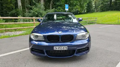 BMW 135i Cabrio — Roadster sportif 306 ch, cabriolet compact prestige — fianco