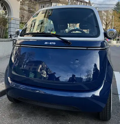 Micro Microlino Pioneer Medium Range — Citadine électrique compacte, 9800 km seulement — vue extérieure