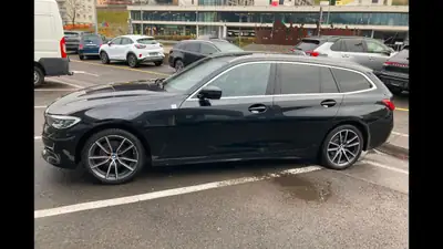 BMW 320d xDrive Touring — Break diesel hybride 48V, 190 ch et transmission intégrale — rear view