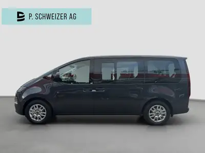 Hyundai Staria Wagon 1.6 T-GDi HEV Amplia — Monospace hybride 9 places, quasi neuf — côté