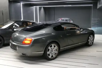 Bentley Continental GT 6.0 Mulliner 2005 — Coupé grand tourisme de prestige, moteur W12 560 ch — Miniatur 7