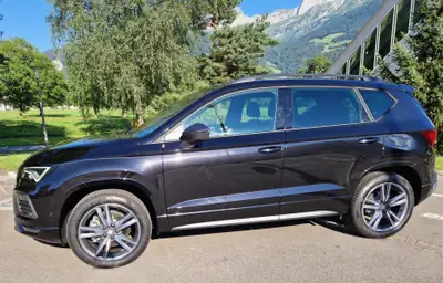 SEAT Ateca 2.0 TDI FR 4Drive — SUV robuste, transmission DSG, attelage pivotant — Heckansicht