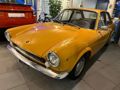 FIAT 124 Sport Coupé 1968 – Un classique italien restauré à la perfection — side view