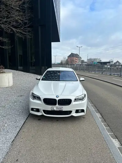 BMW ActiveHybrid 5 Steptronic — Berline hybride sportive, 340 ch et consommation maîtrisée — côté