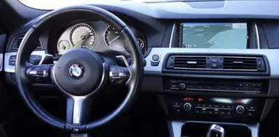 BMW ActiveHybrid 5 Steptronic — Berline hybride sportive, 340 ch et consommation maîtrisée — Miniature 7