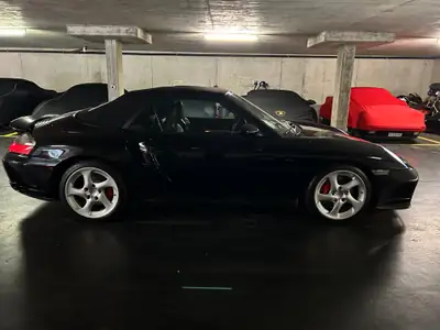 Porsche 911 Turbo Cabrio 2005 — Légendaire roadster turbo, boîte manuelle d'exception — fianco