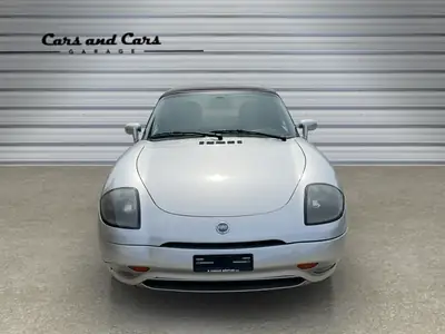 Fiat Barchetta 1.8 — Cabriolet sportif des années 2000, climatisation et contrôle ABS — côté