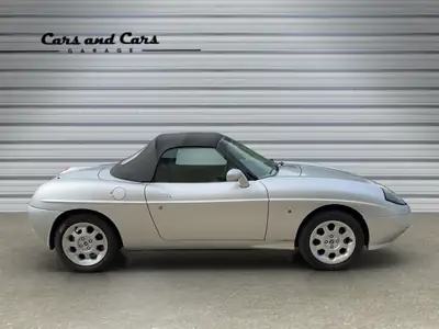 Fiat Barchetta 1.8 — Cabriolet sportif des années 2000, climatisation et contrôle ABS — intérieur
