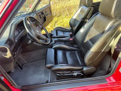 BMW M3 E30 1989 — Légende sportive rouge, 54 500 km, boîte manuelle — dettaglio