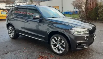 BMW X5 xDrive 30d — SUV premium performant, 146'000 km, sans sinistre — Heckansicht