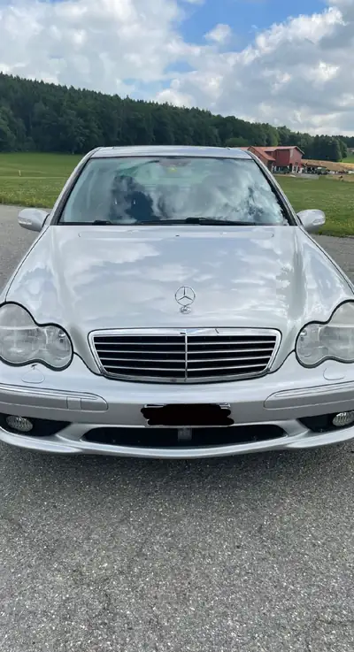 Mercedes-Benz C 32 AMG — Berline sportive 354 ch, automata performante — Seitenansicht